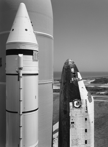 Space Shuttle Discovery at Launch Pad by John Sexton